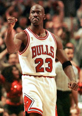 Michael Jordan of the Chicago Bulls pumps his fist